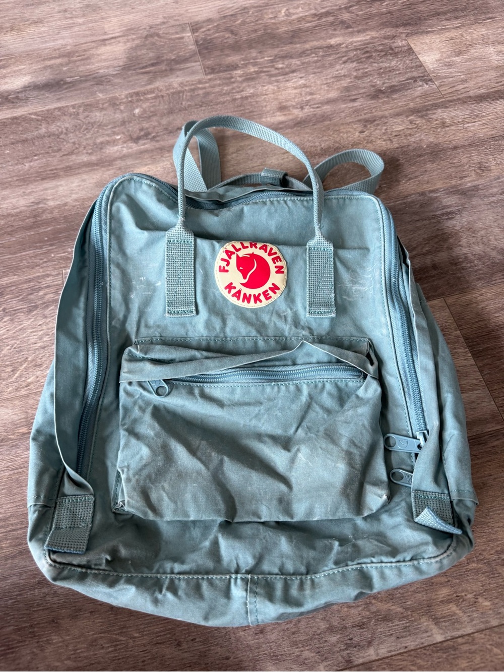 Classic Fjällräven Kånken Classic Backpack in a light blue/green
